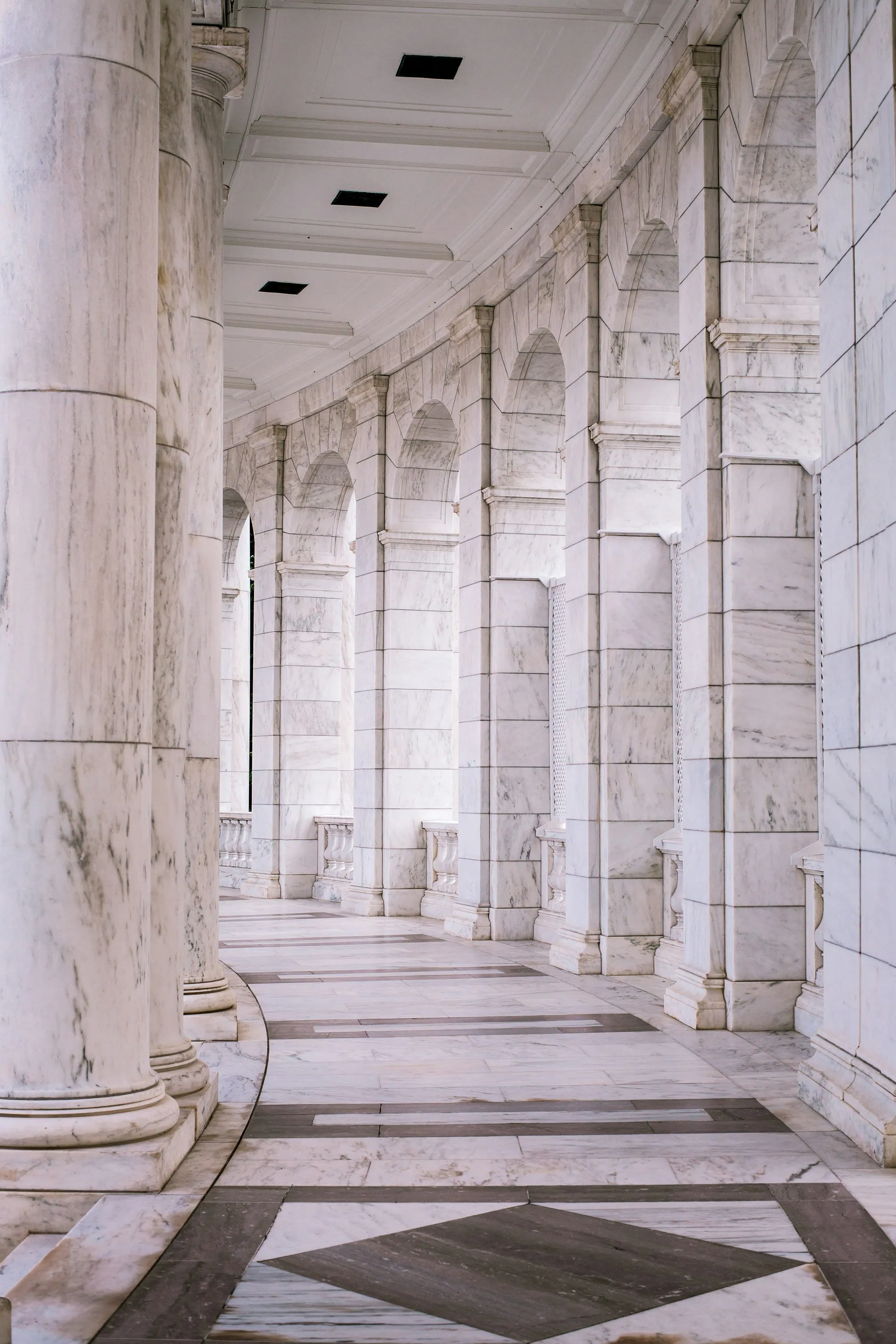A classical marble colonnade: permanence, judgment and order.